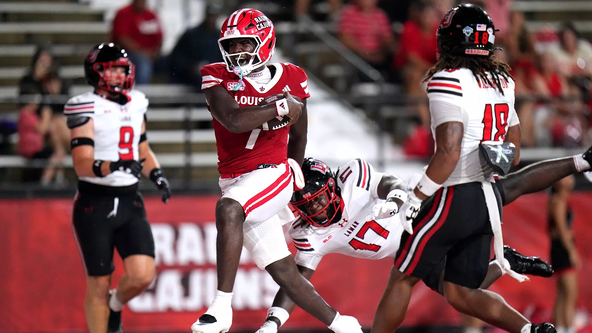 RAGIN CAJUNS RUSH TO VICTORY OVER LAMAR